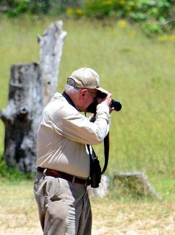 George Pond photographing birds